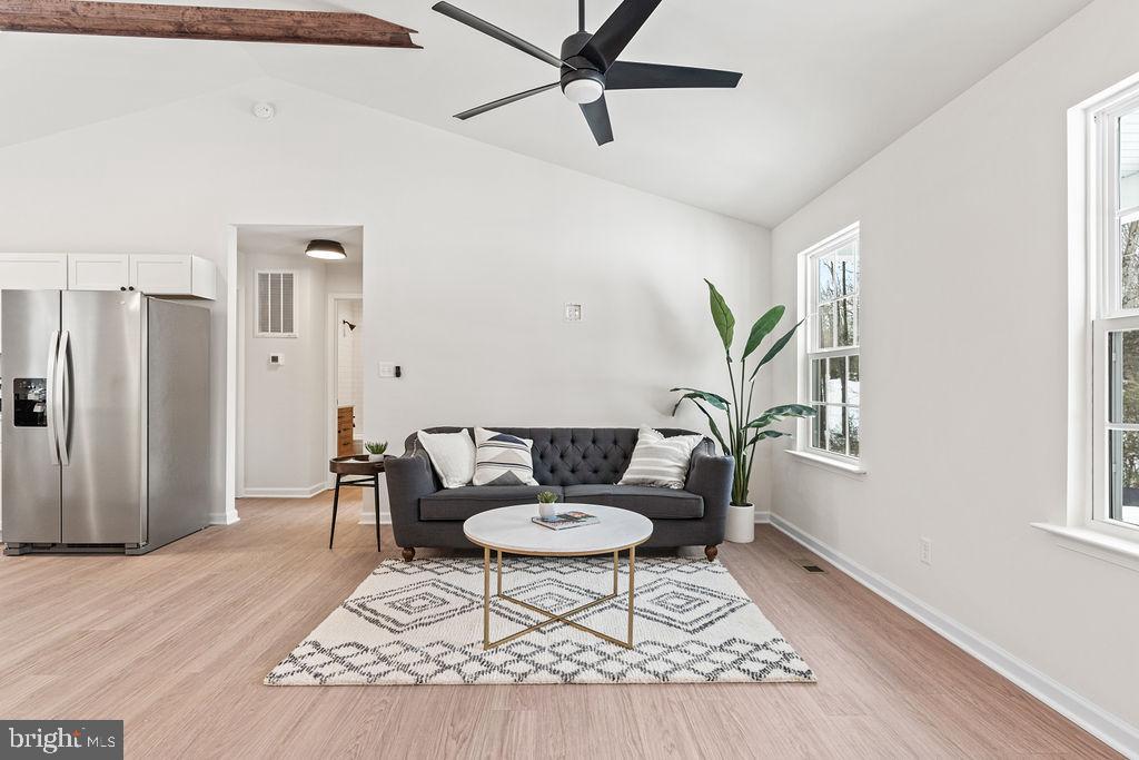 22366 Monrovia Road Orange, VA 22960 - Photo 26 of 53 a living room with furniture and a rug
