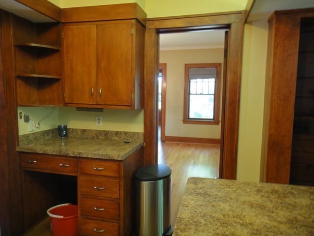 433 Normal Road DeKalb, IL 60115 - Photo 10 of 18 a bathroom with a granite countertop sink and a mirror