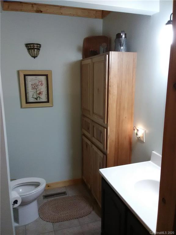308 Cinnamon Ridge Rutherfordton, NC 28139 - Photo 7 of 19 a bathroom with a refrigerator and a sink