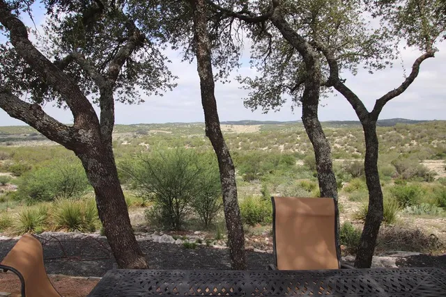 a kitchen with a stove and a refrigerator