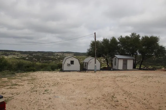 a view of a lake from a yard