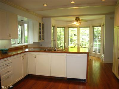 3317 Ingleside Road Shaker Heights, OH 44122 - Photo 6 of 19 Updated white eat-in kitchen with gas cooktop, subzero, double oven & built-in desk.