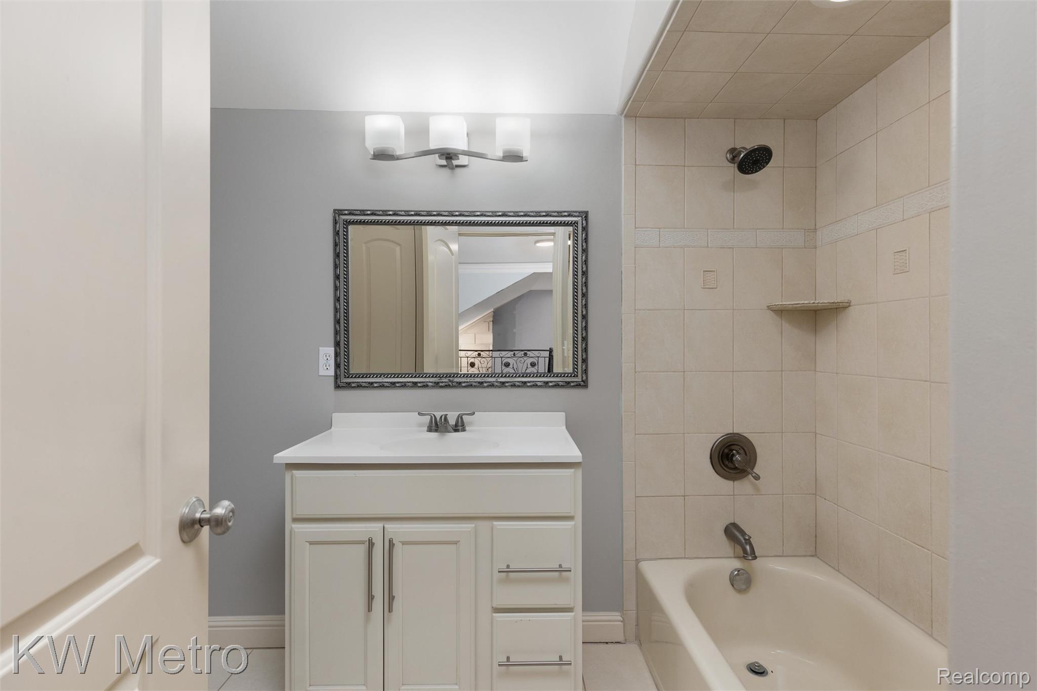 65884 Windrose Court Ray, MI 48096 - Photo 69 of 82 Bathroom with vanity and shower / bathtub combination