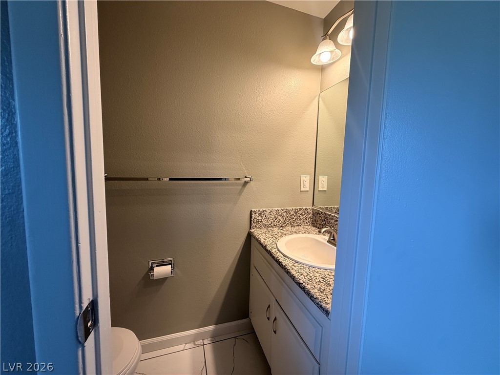1525 Saylor Way Las Vegas, NV 89108 - Photo 7 of 25 Down Stairs 1/2 Bath