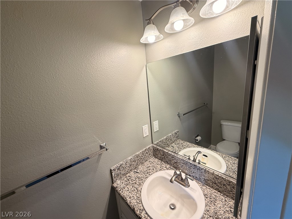 1525 Saylor Way Las Vegas, NV 89108 - Photo 8 of 25 Down Stairs 1/2 Bath