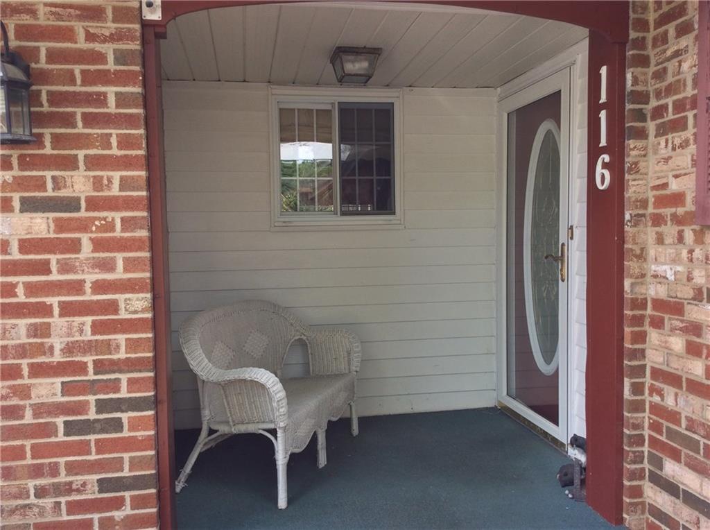 116 Hampton Court Butler, PA 16002 - Photo 21 of 25 An inviting, covered front porch welcomes guests.