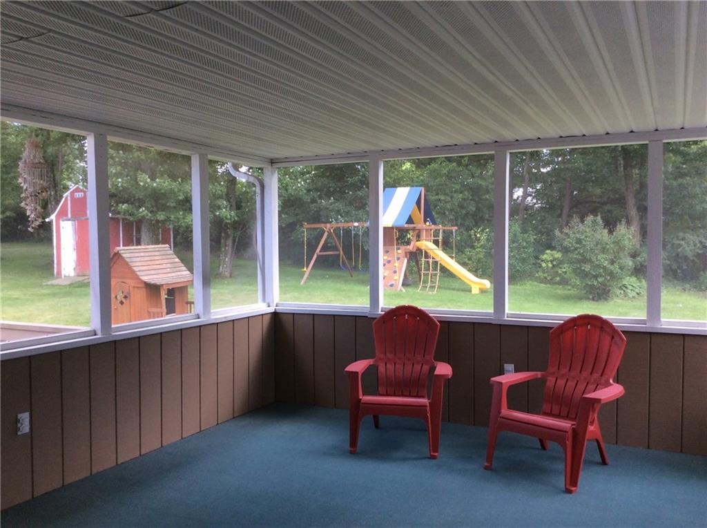 116 Hampton Court Butler, PA 16002 - Photo 22 of 25 The screened-in porch is a great area to spend the warmer months and has access to both the deck and the dining room.