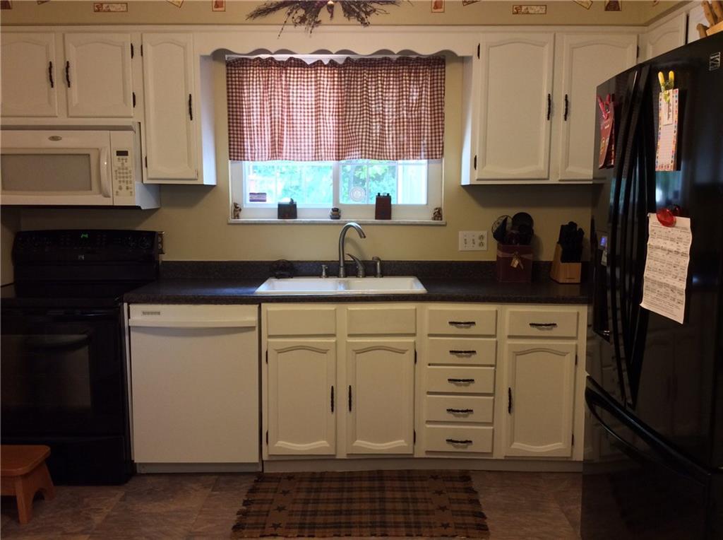 116 Hampton Court Butler, PA 16002 - Photo 4 of 25 A great view and accessibility to the back yard and deck are plusses for this kitchen.