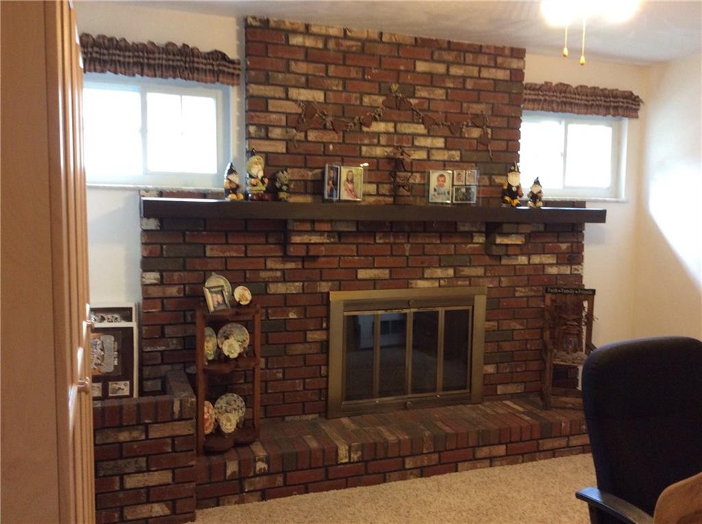 116 Hampton Court Butler, PA 16002 - Photo 8 of 25 The current owners have never used the fireplace, so for now, this is probably decorative, though it could be redone to be functional for this cozy den.