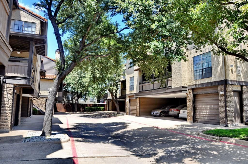 5630 Spring Valley Road, Unit 23A Dallas, TX 75254 - Photo 2 of 18 a front view of a house with a yard
