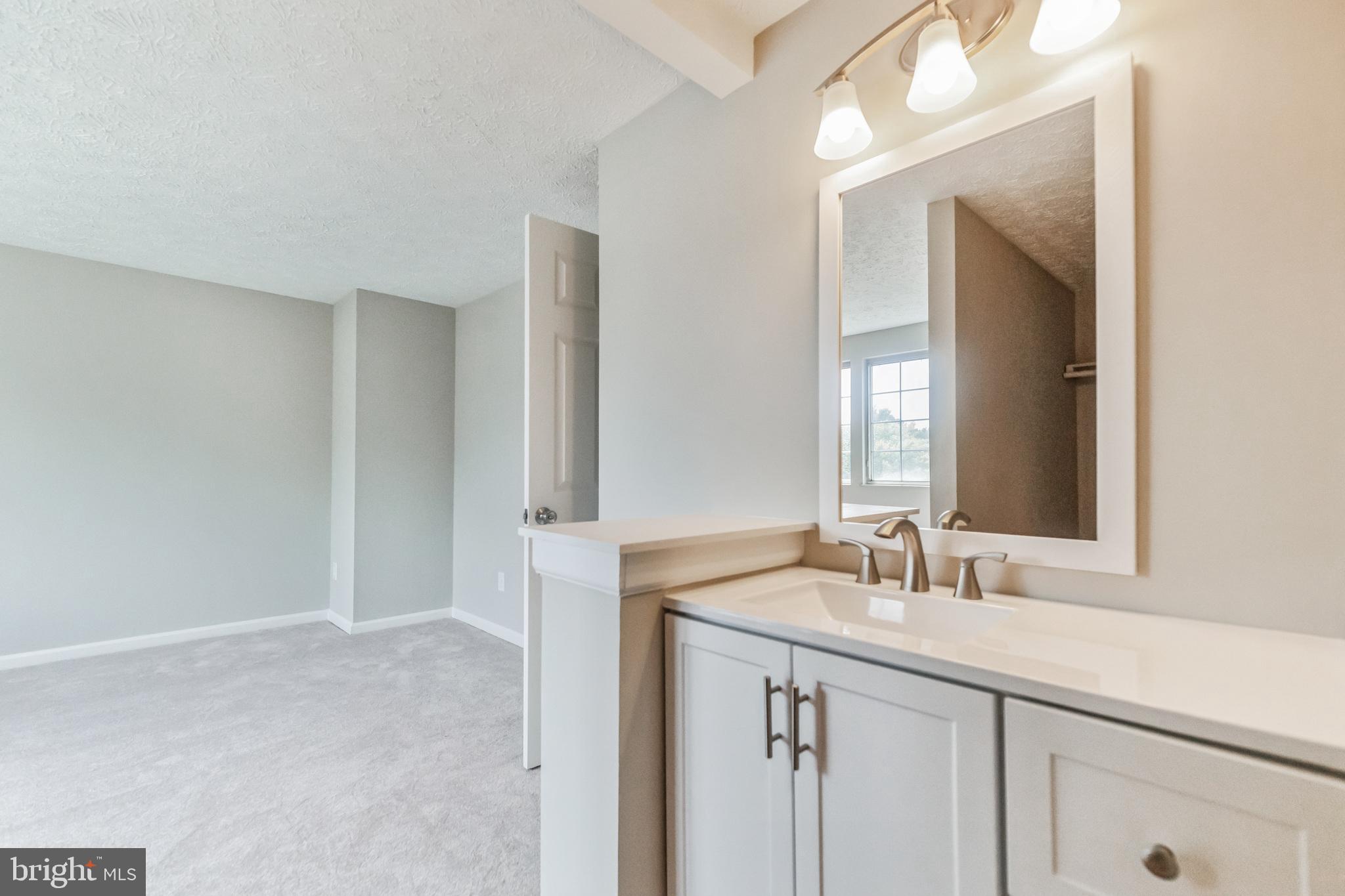 503 Cross Ridge Court Stafford, VA 22554 - Photo 18 of 26 half wall keeps sink separate from bedroom