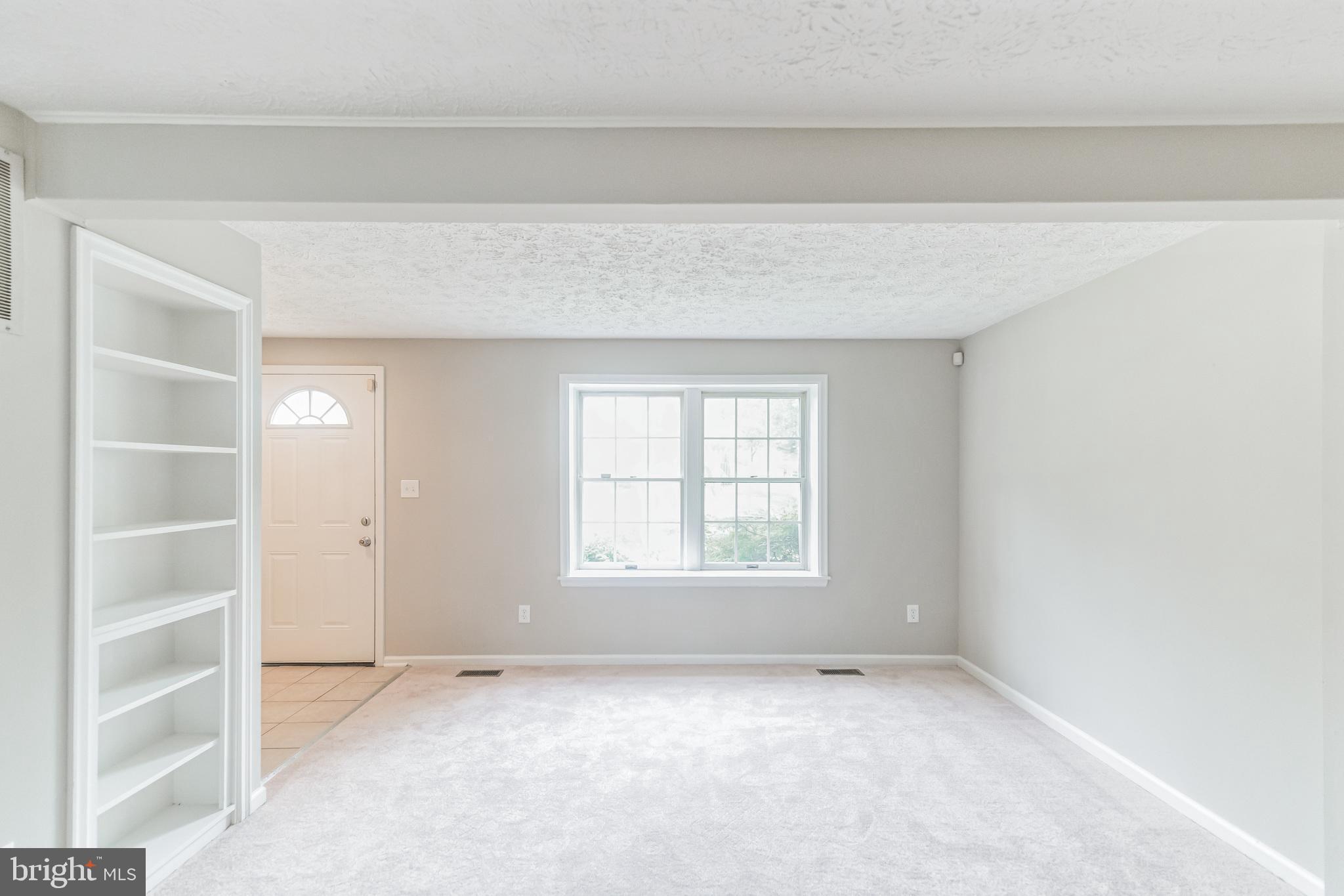 503 Cross Ridge Court Stafford, VA 22554 - Photo 2 of 26 Spacious family room with built in book shelf