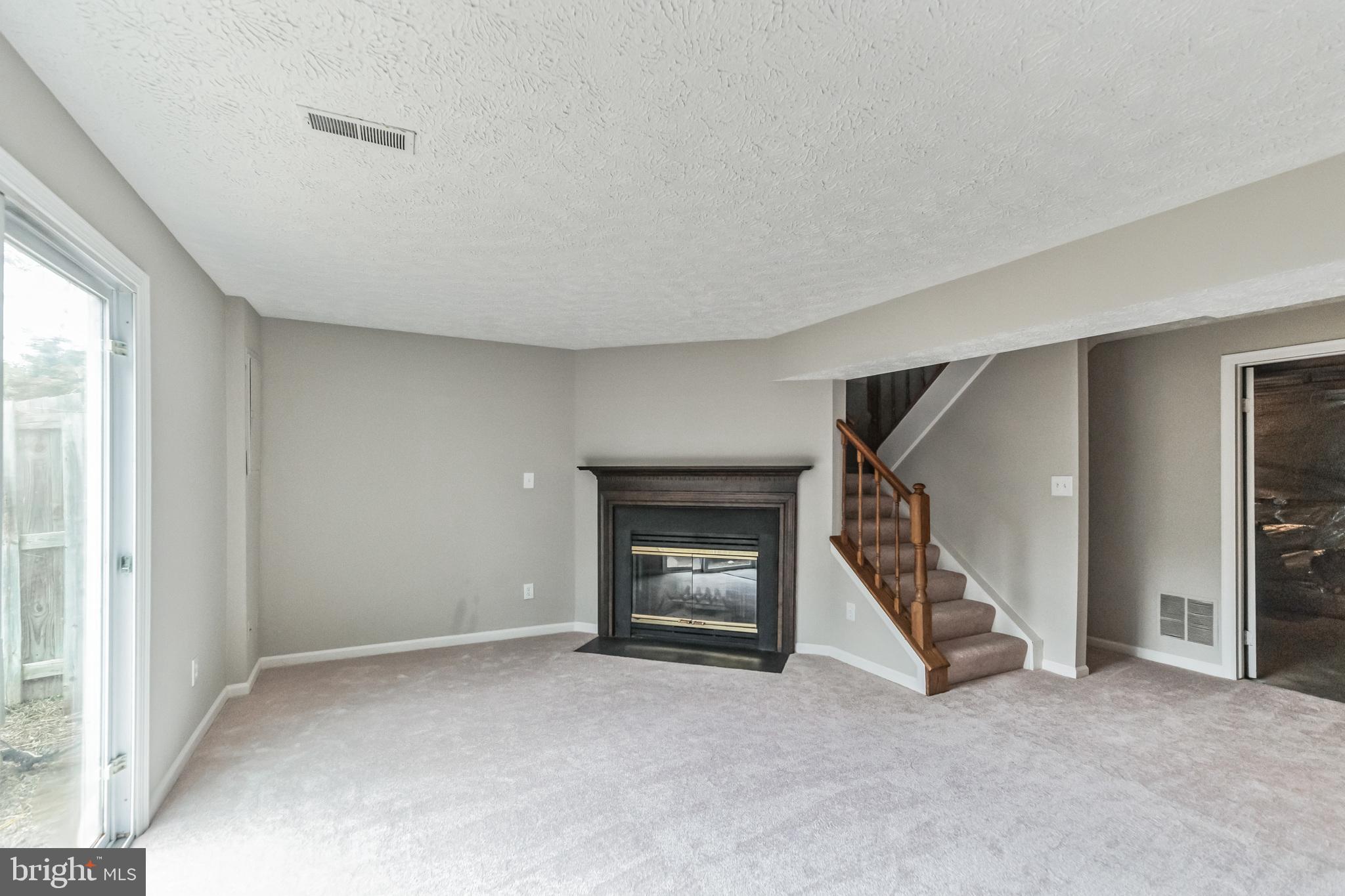 503 Cross Ridge Court Stafford, VA 22554 - Photo 23 of 26 Rec room has a wood burning fireplace