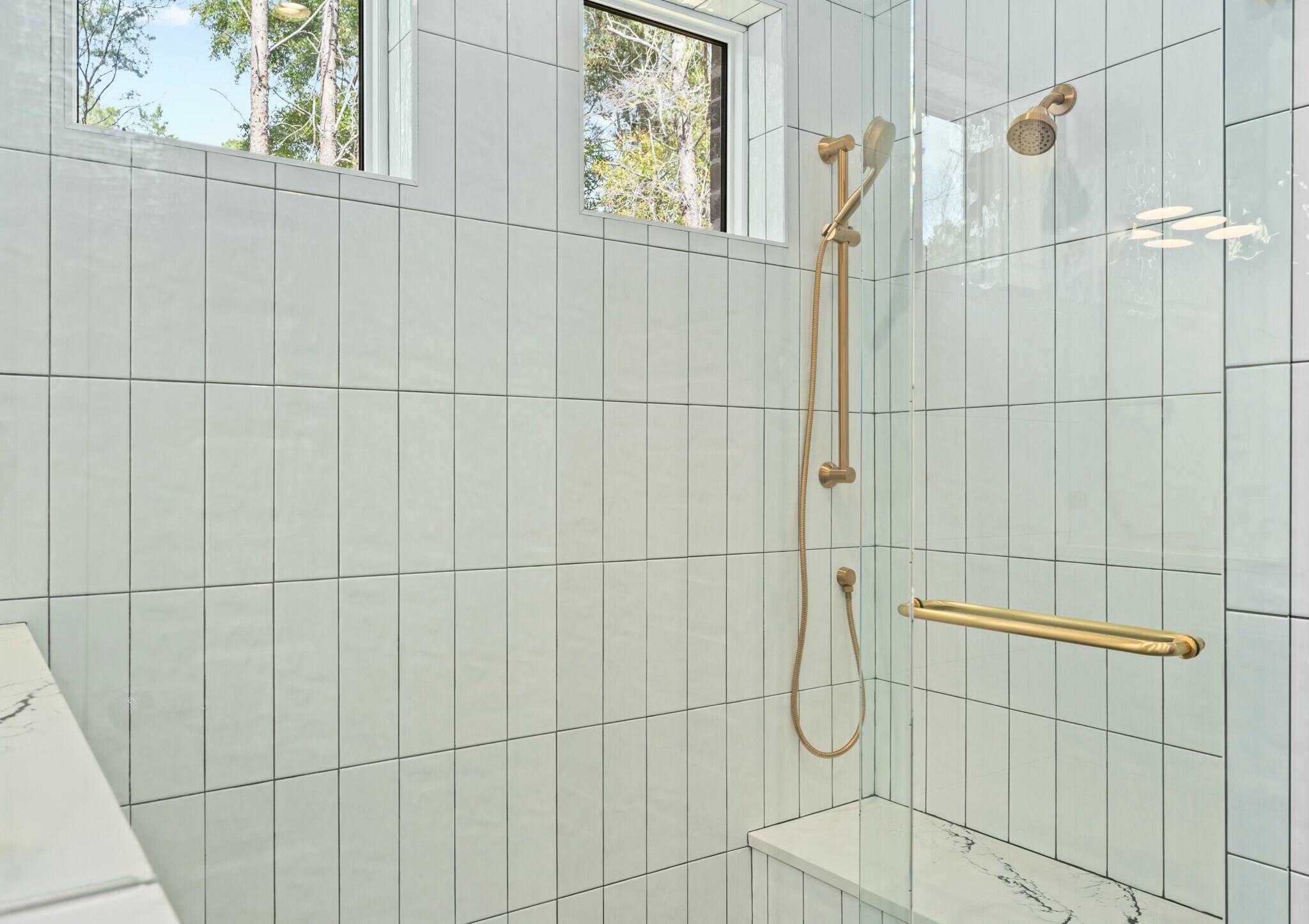 73 Sparkle Street Freeport, FL 32439 - Photo 24 of 27 a bathroom with a shower