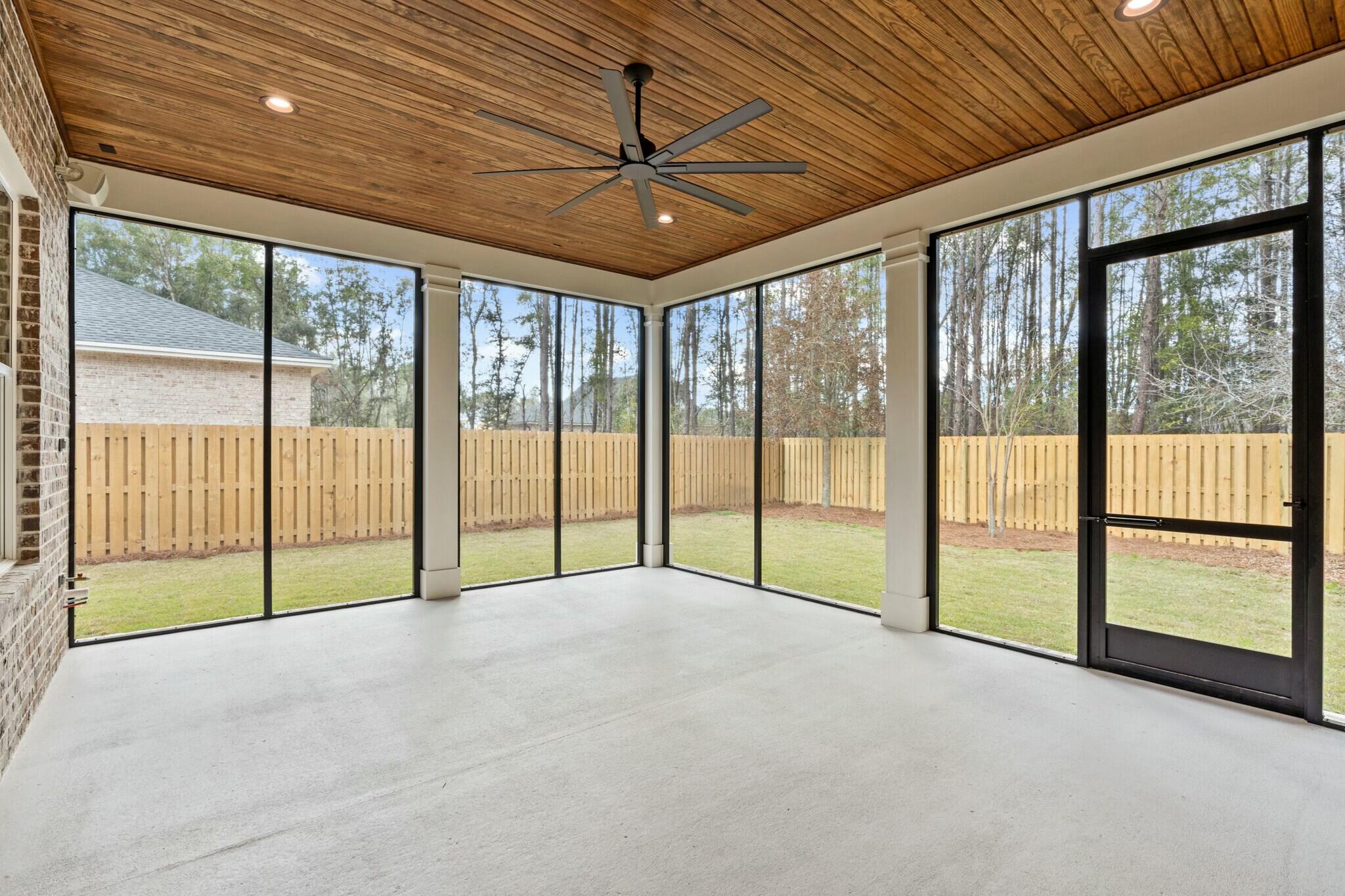 73 Sparkle Street Freeport, FL 32439 - Photo 26 of 27 a view of an empty room with sliding glass door