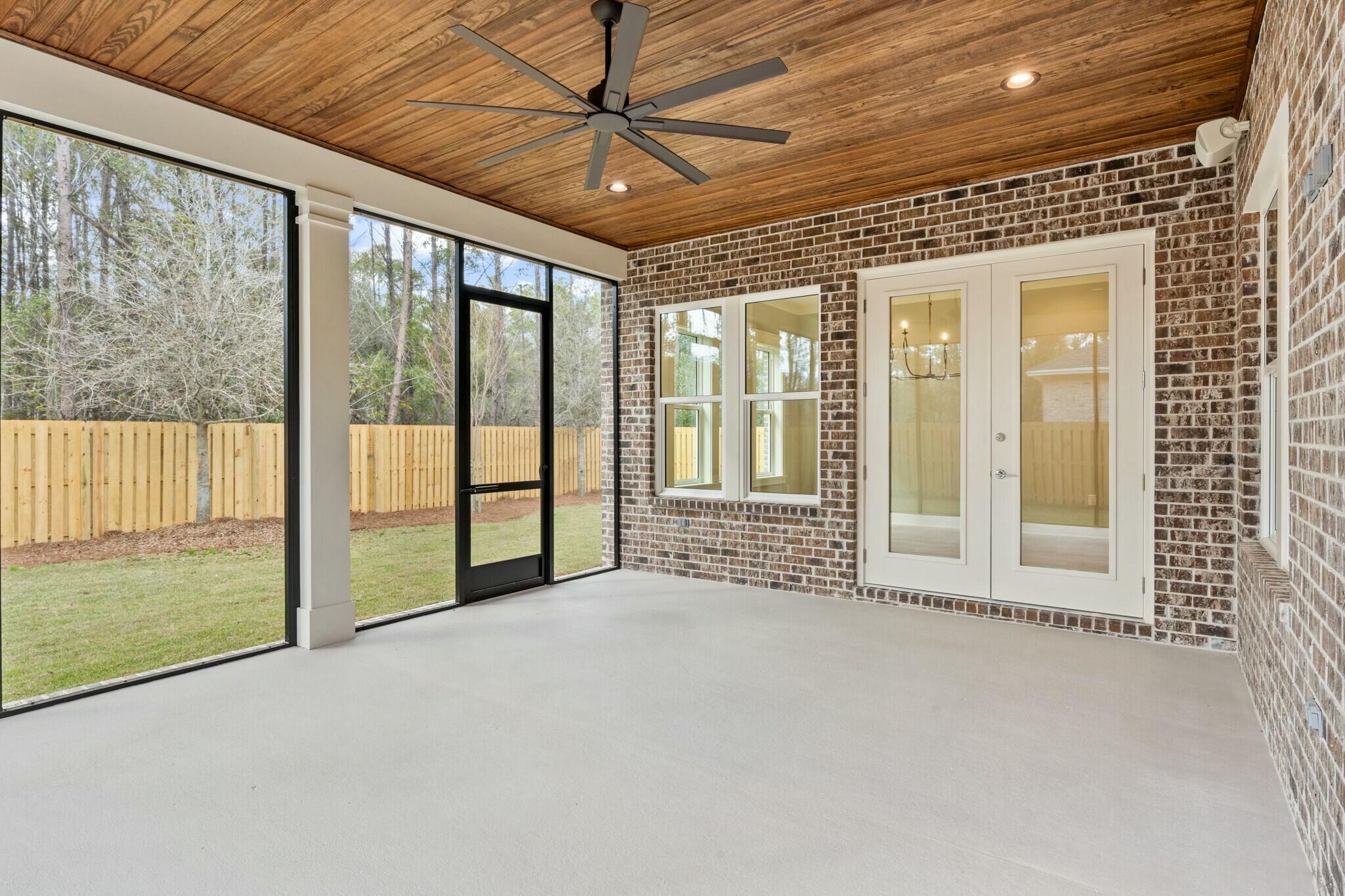 73 Sparkle Street Freeport, FL 32439 - Photo 27 of 27 a view of an empty room with windows