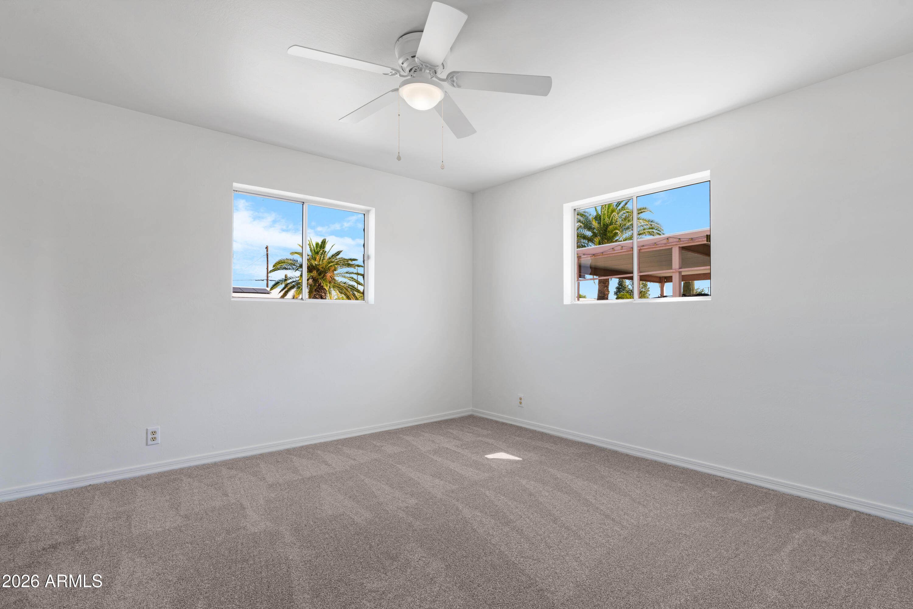 5437 East Butte Street Mesa, AZ 85205 - Photo 25 of 56 wooden floor in an empty room with a window