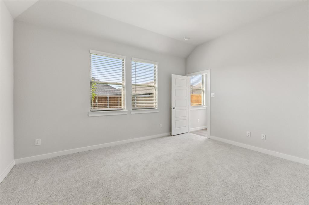 2802 Parkside Trail Princeton, TX 75407 - Photo 12 of 21 a view of an empty room with a window