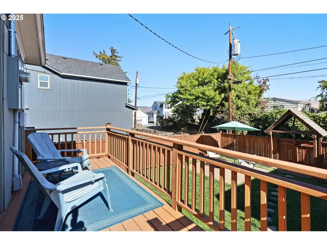 a balcony view with a seating space