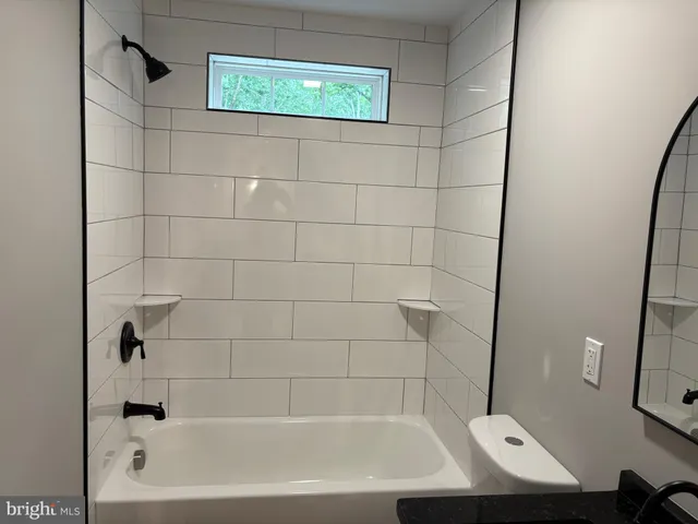 a bathroom with a bathtub