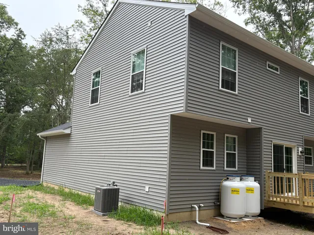 a view of house with outdoor space