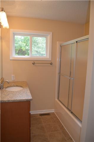 110 Shorter Road Lebanon, TN 37090 - Photo 14 of 16 Hall bath has tile floor, new fixtures and tub/shower combination.