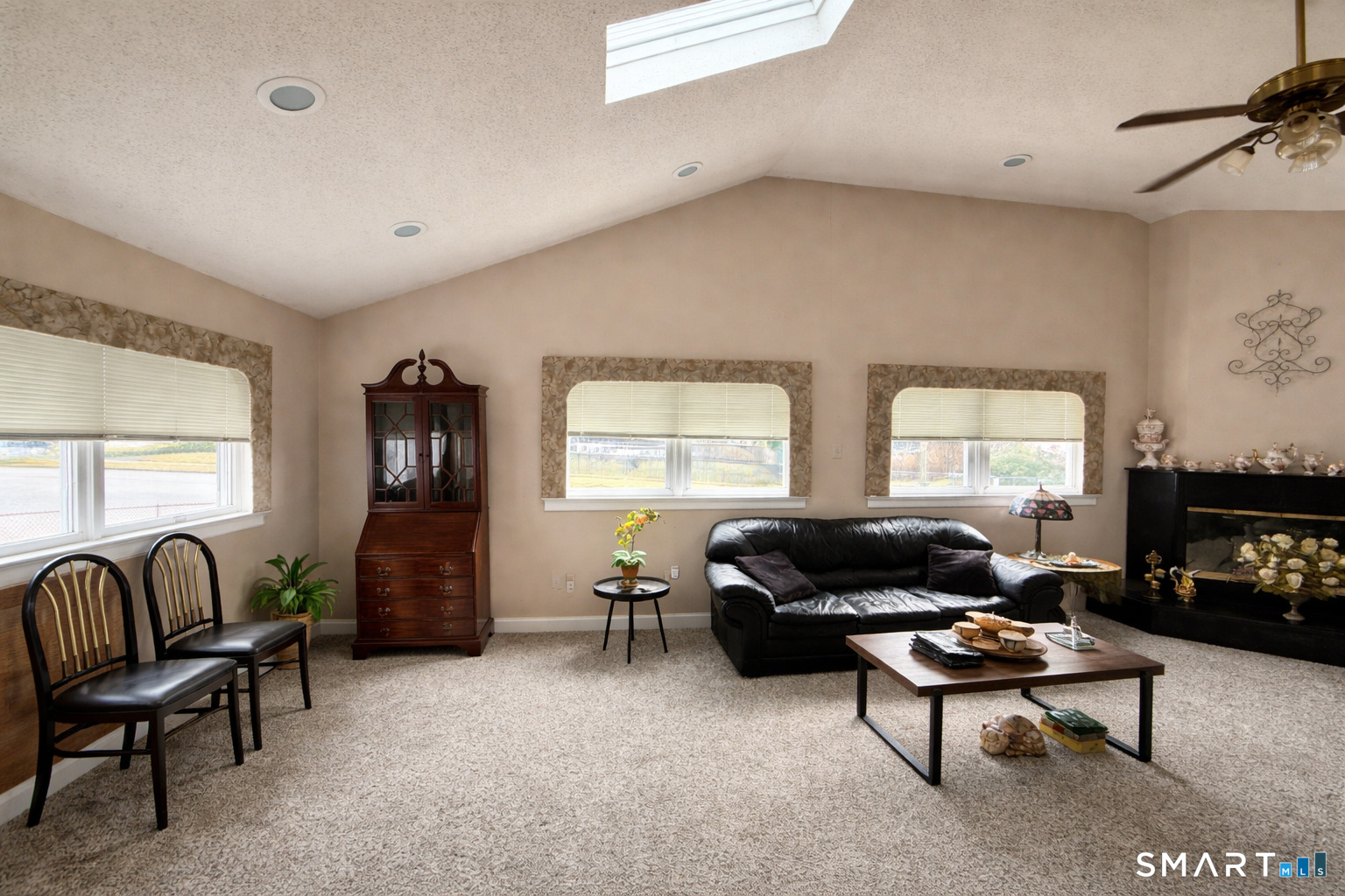 3 7th Street Newington, CT 06111 - Photo 4 of 13 a living room with furniture window and a flat screen tv