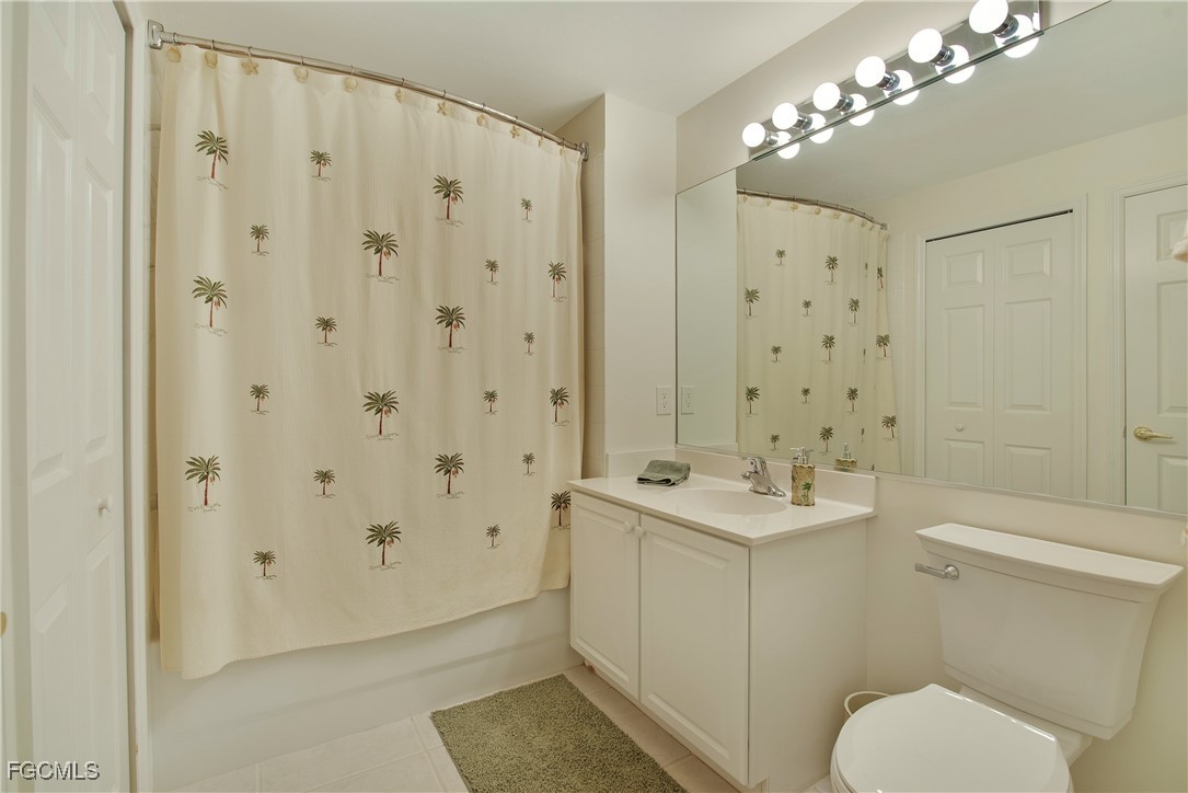 9631 Hemingway Lane, Unit 3610 Fort Myers, FL 33913 - Photo 12 of 21 a bathroom with a sink toilet and shower