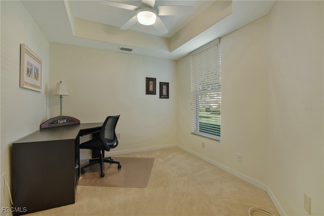9631 Hemingway Lane, Unit 3610 Fort Myers, FL 33913 - Photo 13 of 21 a view of a workspace with furniture and a window