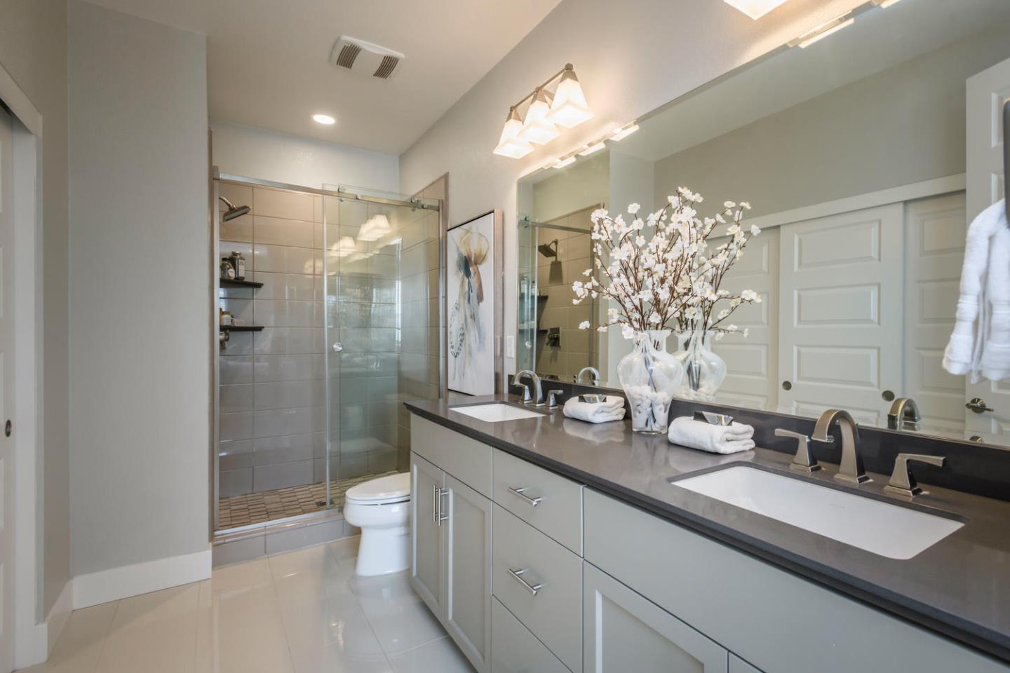 2864 Baze Road San Mateo, CA 94403 - Photo 15 of 20 a spacious bathroom with double vanity and a shower