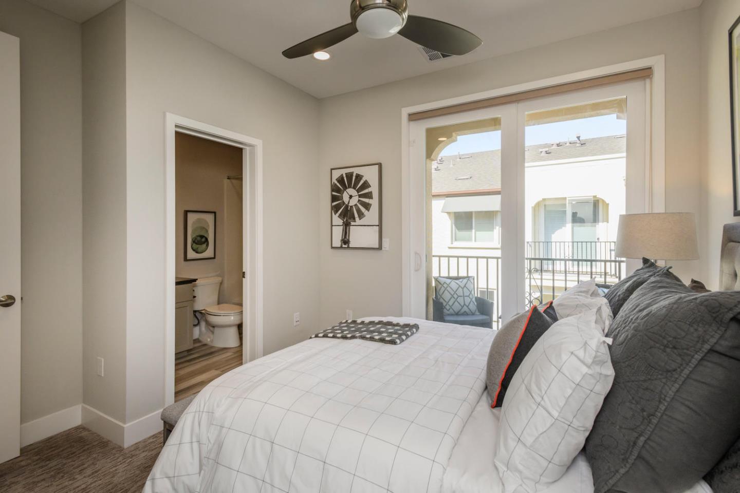 2864 Baze Road San Mateo, CA 94403 - Photo 17 of 20 a bedroom with a bed and a large window