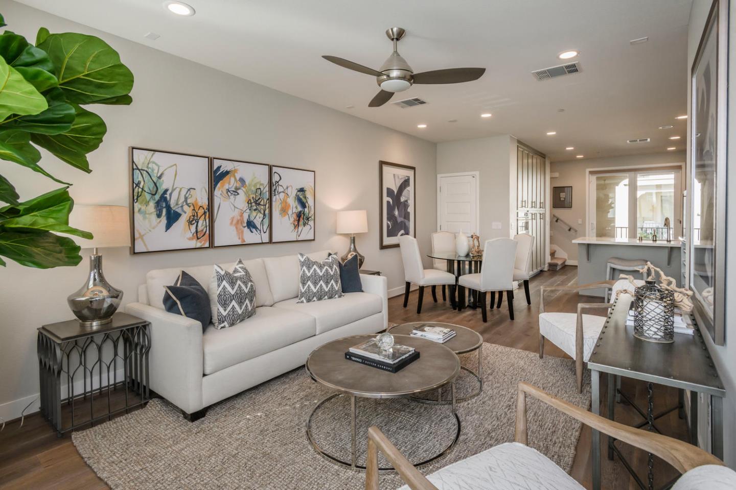 2864 Baze Road San Mateo, CA 94403 - Photo 5 of 20 a living room with furniture a rug and a chandelier