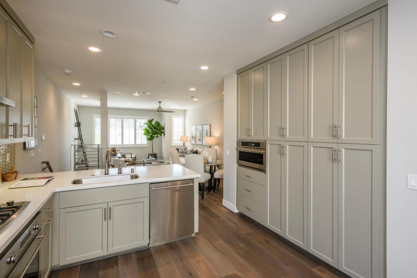 2864 Baze Road San Mateo, CA 94403 - Photo 9 of 20 a kitchen with sink microwave and refrigerator