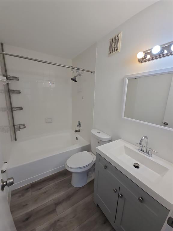 12172 St Andrews Place, Unit 305 Miramar, FL 33025 - Photo 20 of 35 a bathroom with a sink toilet a mirror and shower