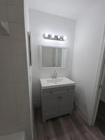 a bathroom with a bathtub and toilet