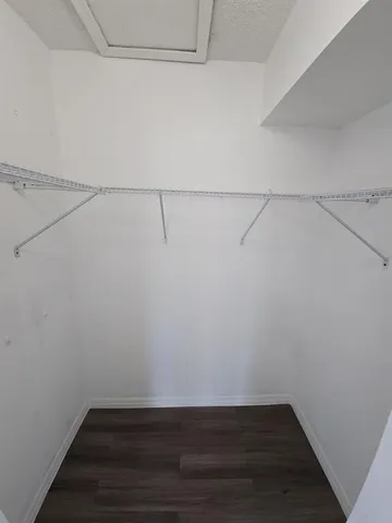 a view of a room with racks on the wall