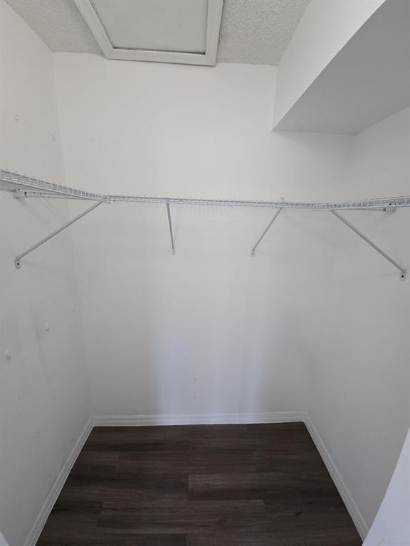 12172 St Andrews Place, Unit 305 Miramar, FL 33025 - Photo 34 of 35 a view of a room with racks on the wall