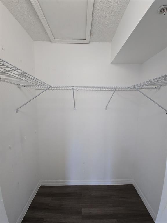 12172 St Andrews Place, Unit 305 Miramar, FL 33025 - Photo 35 of 35 a view of a room with racks on the wall