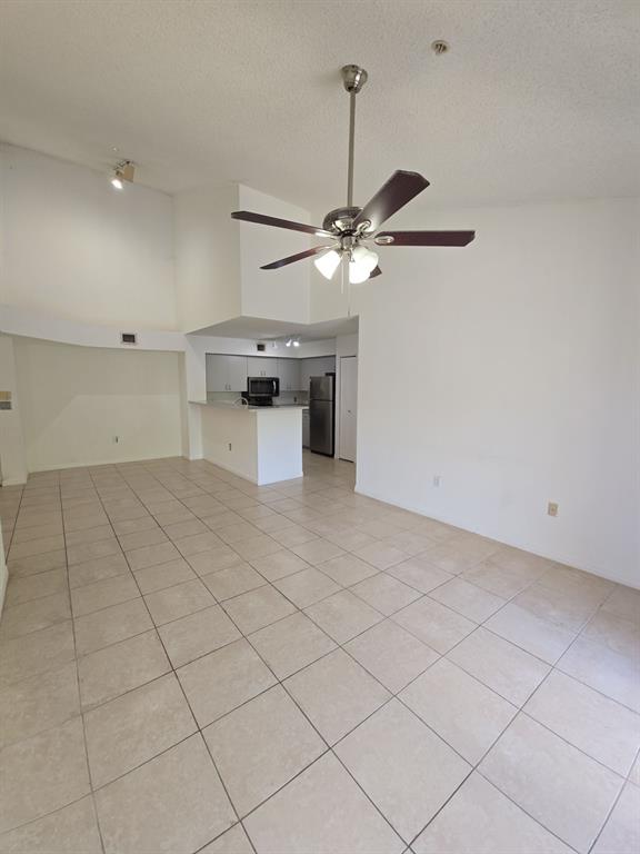 12172 St Andrews Place, Unit 305 Miramar, FL 33025 - Photo 8 of 35 a view of a kitchen with a sink and dishwasher