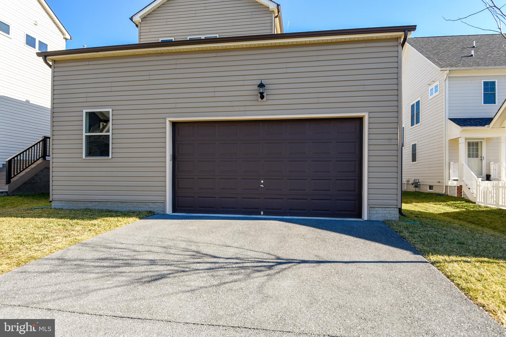 13618 Alderton Road Silver Spring, MD 20906 - Photo 23 of 57 Rear entrance to the 2-car garage