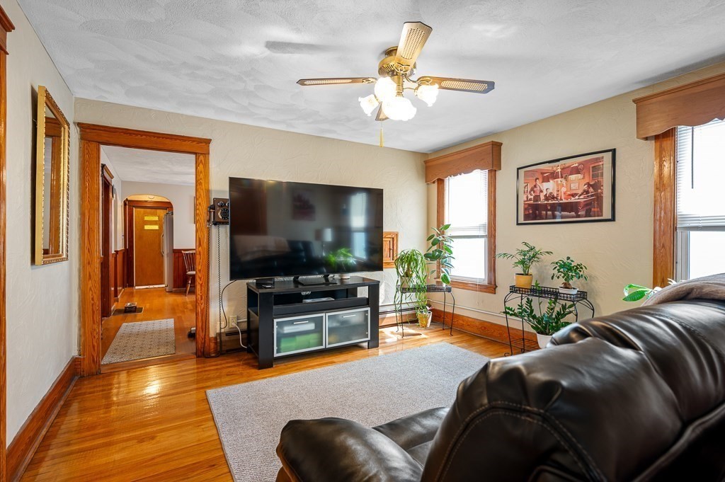 18 Prentice Street Worcester, MA 01604 - Photo 16 of 42 a living room with furniture and a flat screen tv