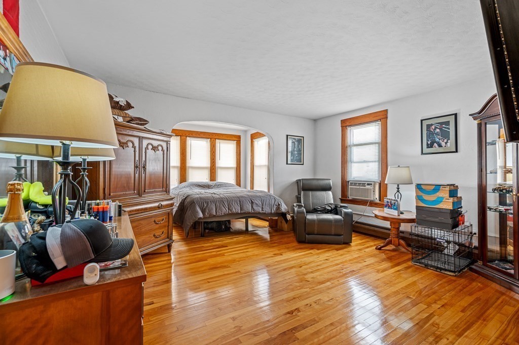18 Prentice Street Worcester, MA 01604 - Photo 21 of 42 a living room with furniture and a fireplace