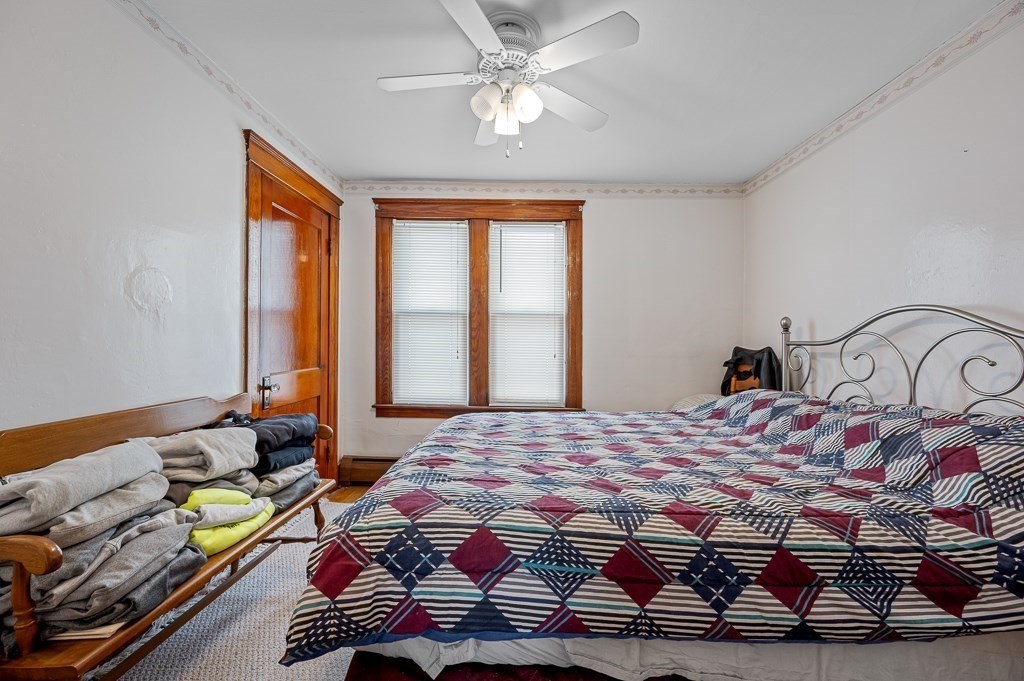 18 Prentice Street Worcester, MA 01604 - Photo 24 of 42 a bedroom with a bed and window