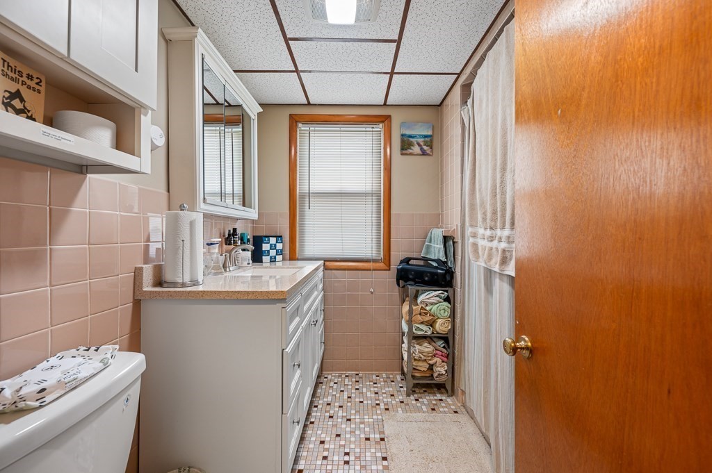 18 Prentice Street Worcester, MA 01604 - Photo 25 of 42 a bathroom with a sink toilet and shower