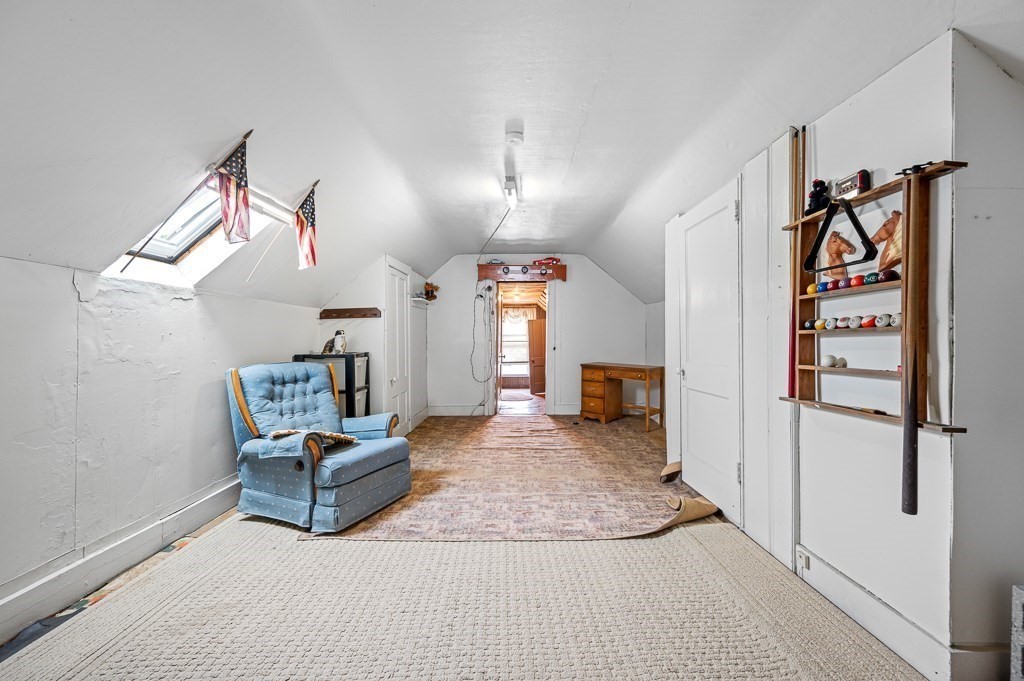 18 Prentice Street Worcester, MA 01604 - Photo 30 of 42 a view of a livingroom with furniture and ceiling fan
