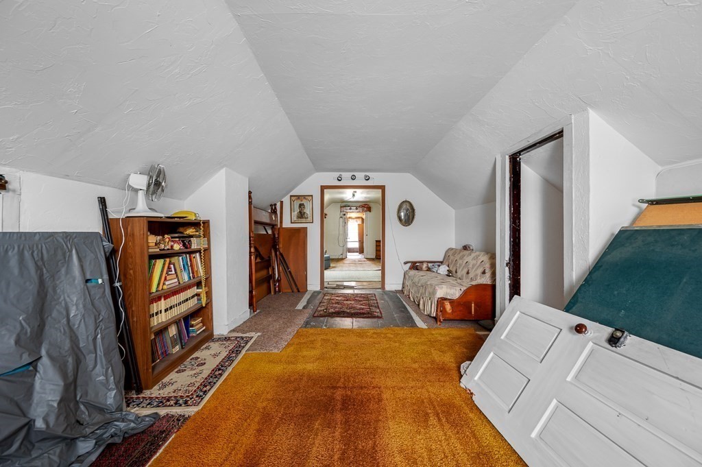 18 Prentice Street Worcester, MA 01604 - Photo 32 of 42 a living room with furniture and a flat tv screen