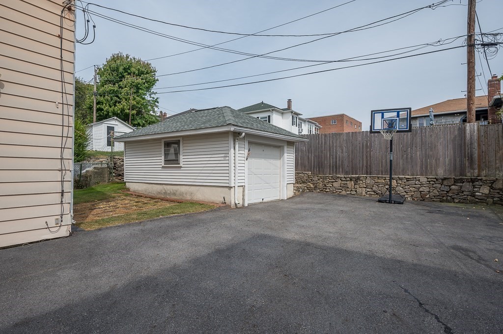 18 Prentice Street Worcester, MA 01604 - Photo 40 of 42 a view of a house with a garage