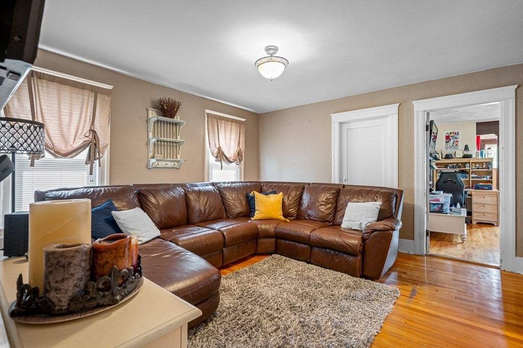 18 Prentice Street Worcester, MA 01604 - Photo 4 of 42 a living room with furniture and a window