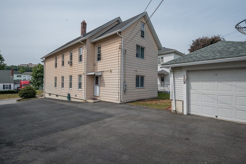 18 Prentice Street Worcester, MA 01604 - Photo 41 of 42 a view of a house with a outdoor space