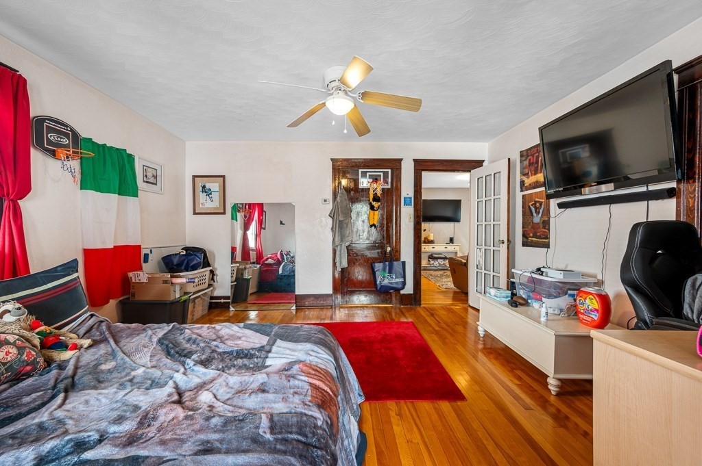 18 Prentice Street Worcester, MA 01604 - Photo 10 of 42 a living room with furniture and a flat screen tv